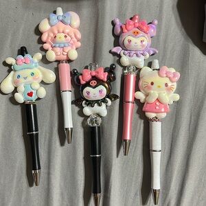 (1) Big Charm Sanrio Pen of your choice.